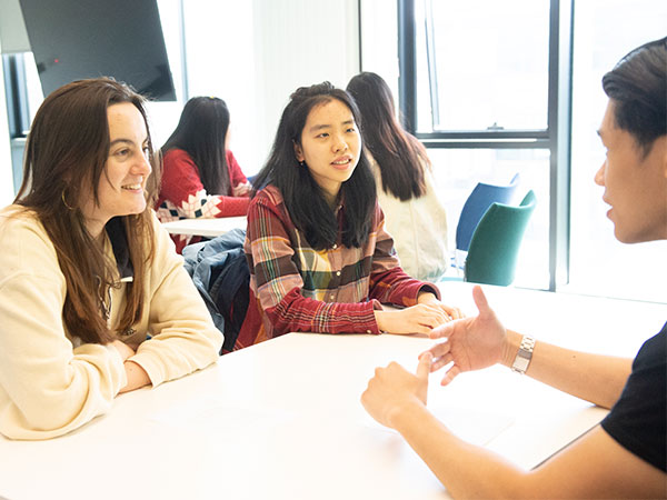 Students working in the library supported learning area