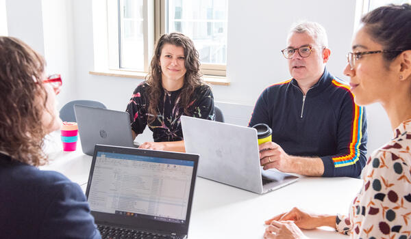 Group meeting sat at table