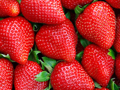 a pile of strawberries