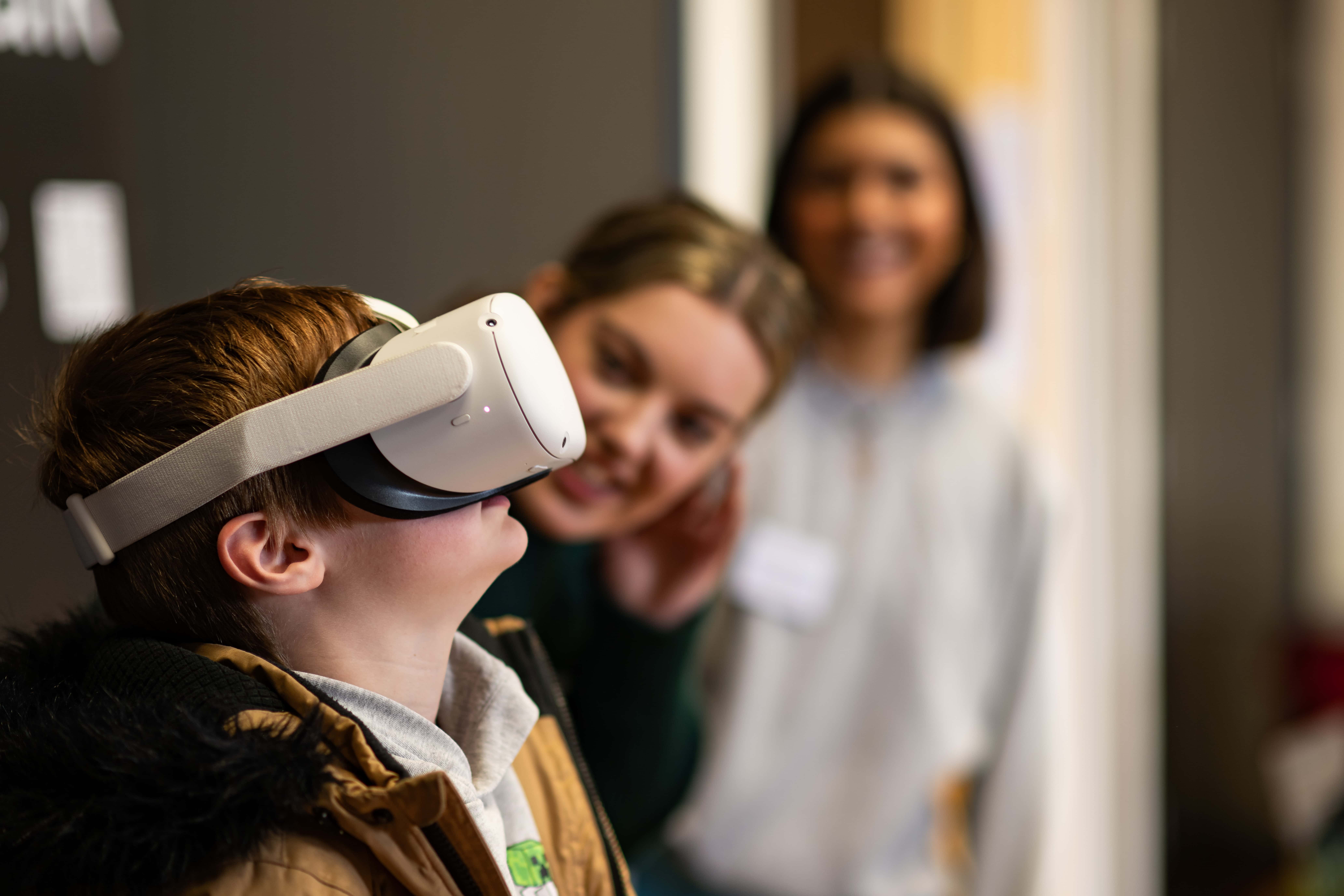 a child wears a VR headset