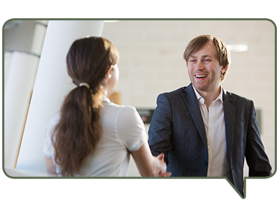 Two members of staff in discussion