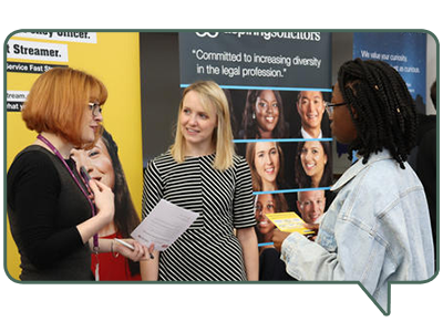 Students and staff and employers meeting at an event