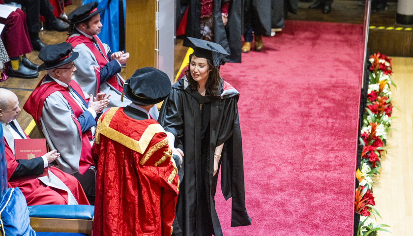 Graduation ceremony student meeting the chancellor