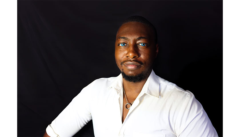 Headshot of Kwesi Busia