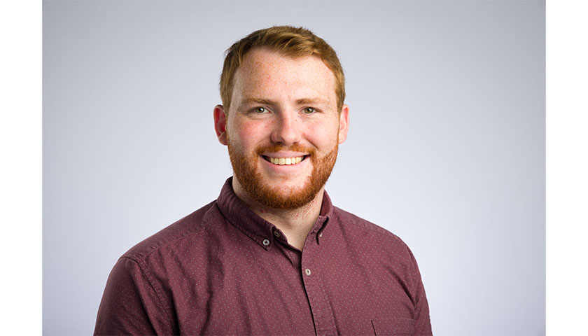 Headshot of Adam Lambe