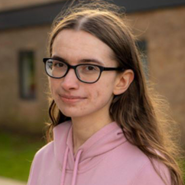 Student smiling at the camera