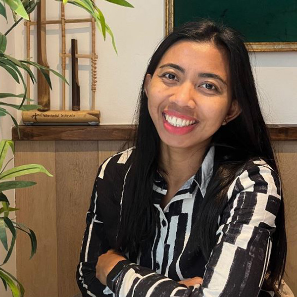 Image of student Siti, smiling at the camera