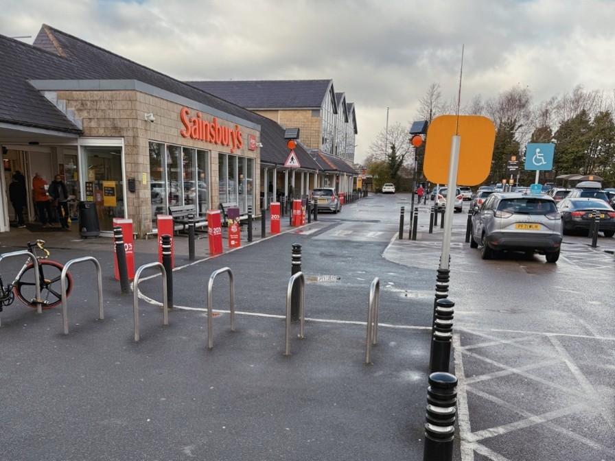 The entrence of the local supermarket, Sainsburys. 