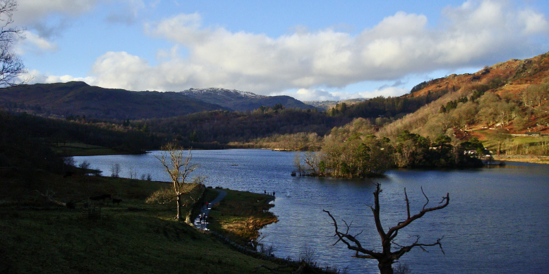 Image of the Lake District with the lake in the foreground, and the mountains in the background