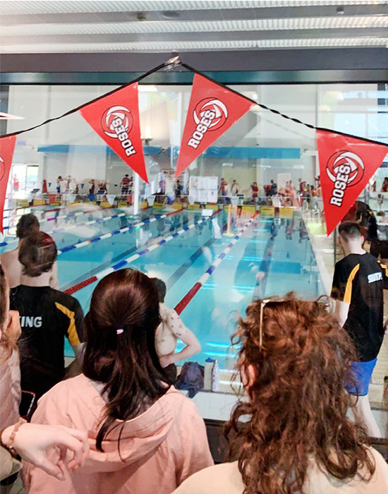 Watching a swimming competition