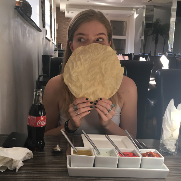 Eating a poppadom at Kashish