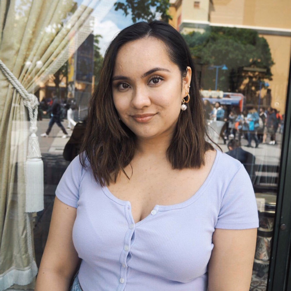 Head and shoulders picture of a female student looking at the camera