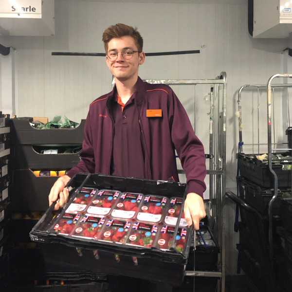A student working in a supermarket