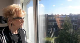 woman looking of window