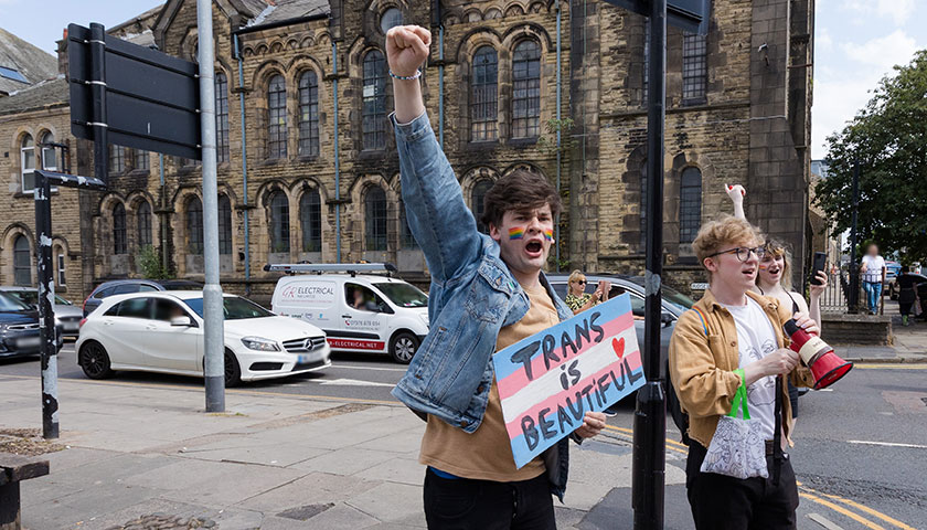 LGBTQ Student's Forum at Lancaster Pride with Trans Is Beautiful sign