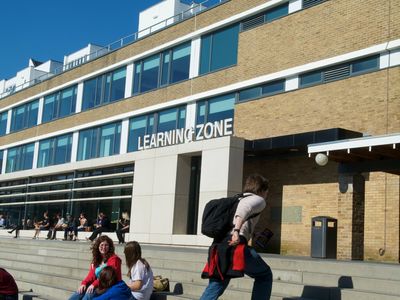 Learning zone and students on steps outside