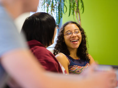 two students laughing