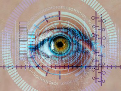 close up of a person's eye with tracking line and binary code surrounding it