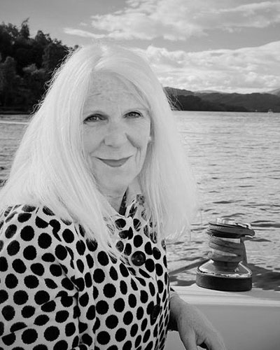 Anne Rothwell sitting on a boat