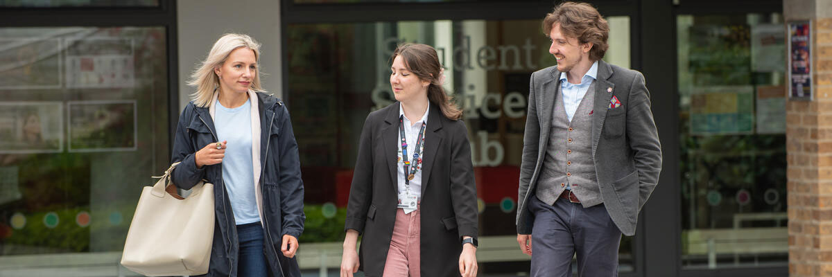 Social Science academics walking and talking at Lancaster University