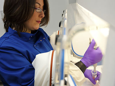 A woman using laboratory equipment