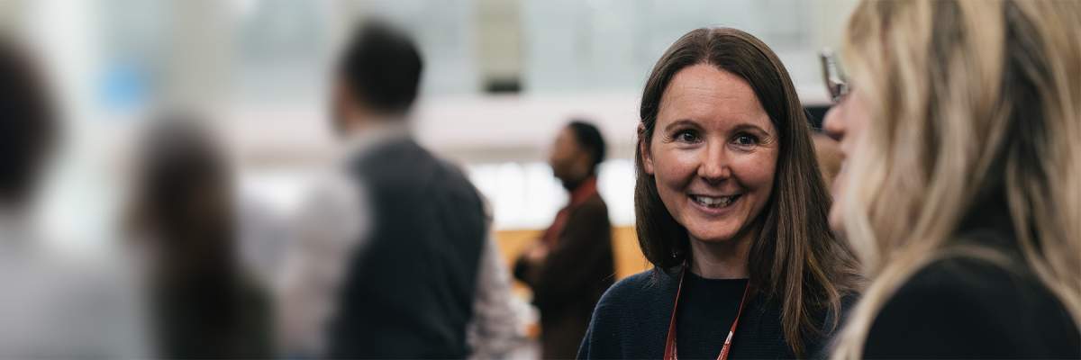 A close up of two businesspeople in conversation