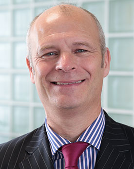 A portrait photograph of Doctor Steve Fish