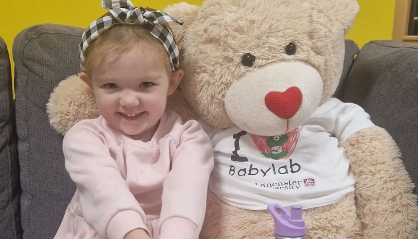 Lisa's daughter with a giant teddy in the ICDL