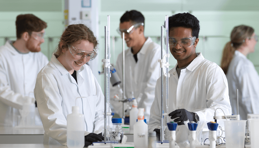 A group of students in the Physical and Analytical teaching lab
