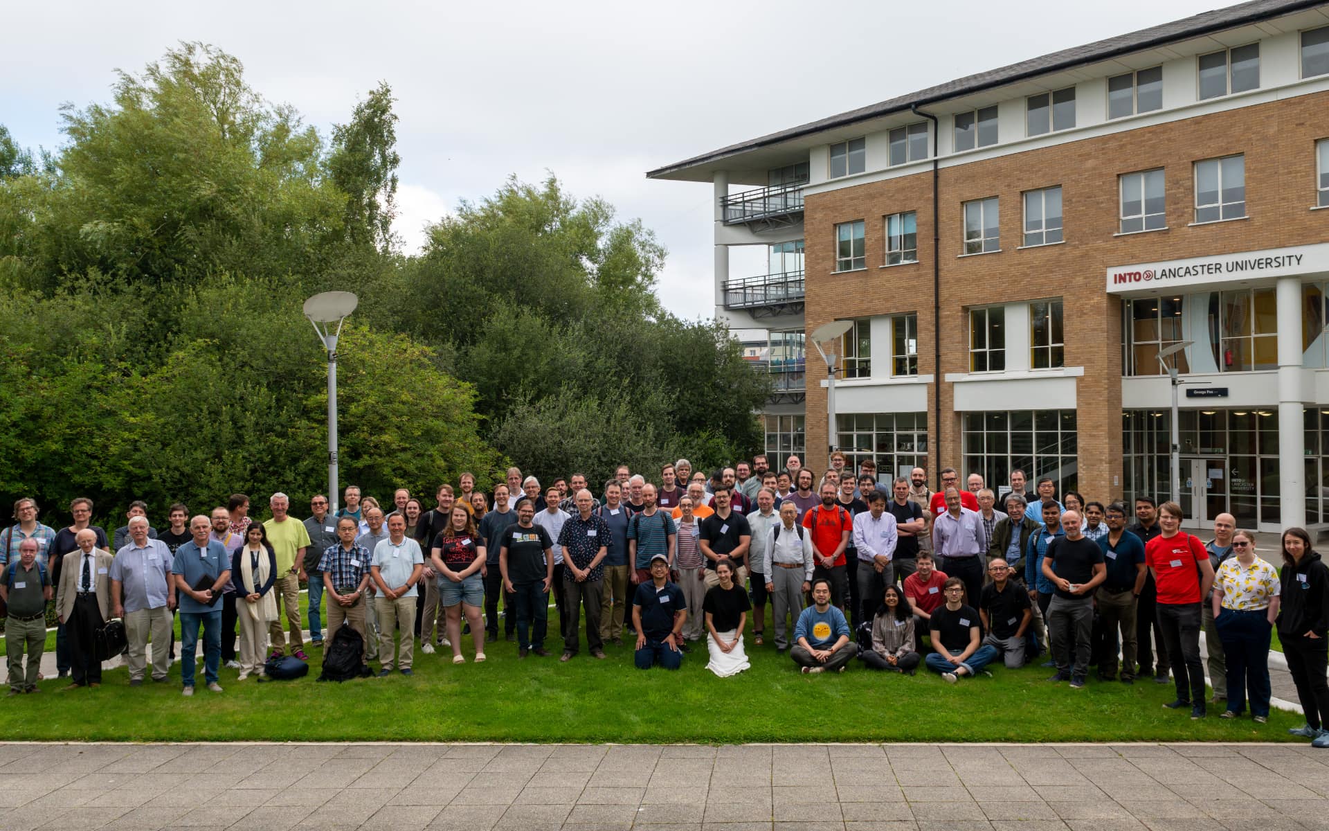 Attendees of ULT 2025 sttod outside George Fox