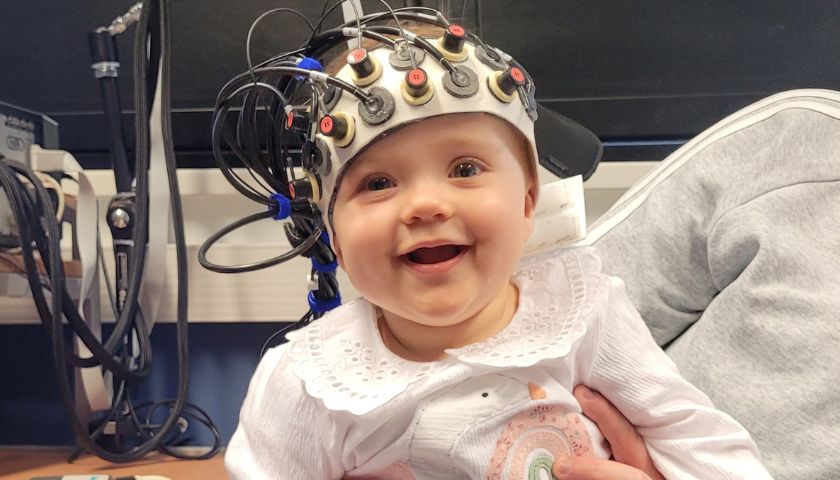 Erin wearing an EEG cap