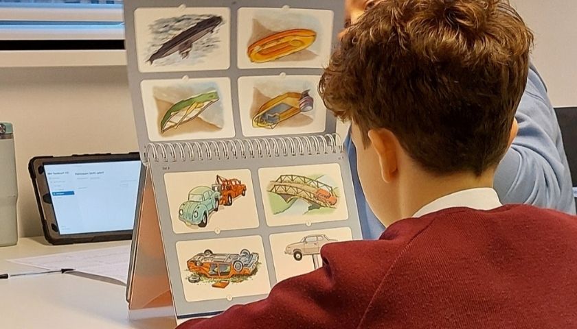 A boy completing one of the ICDL studies