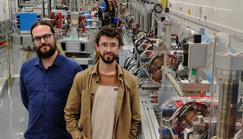 Two academics stood in the CLARA facility