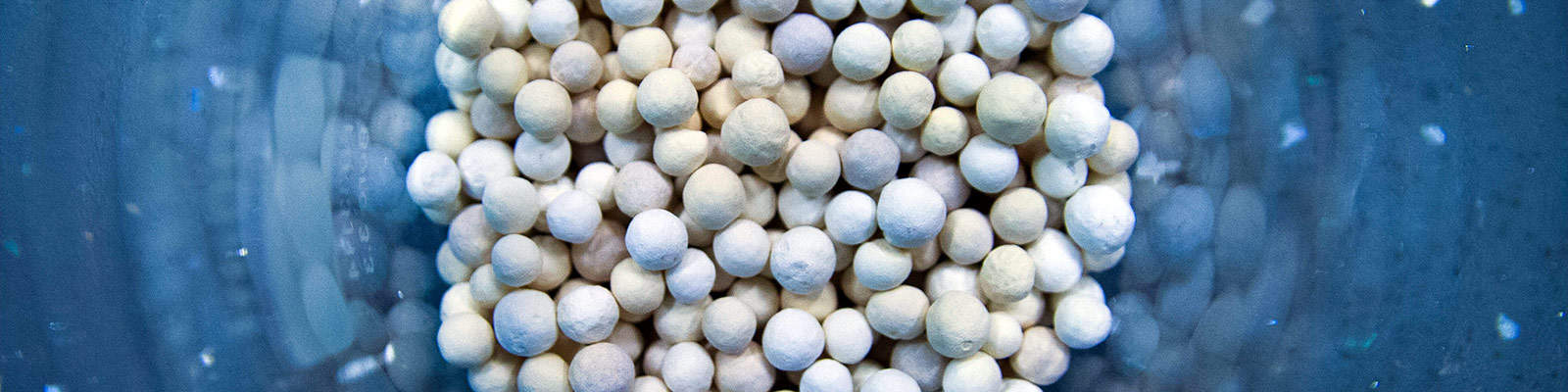 Ceramic beads in a flask