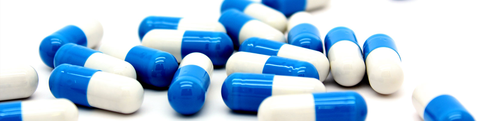 Blue pills on a table