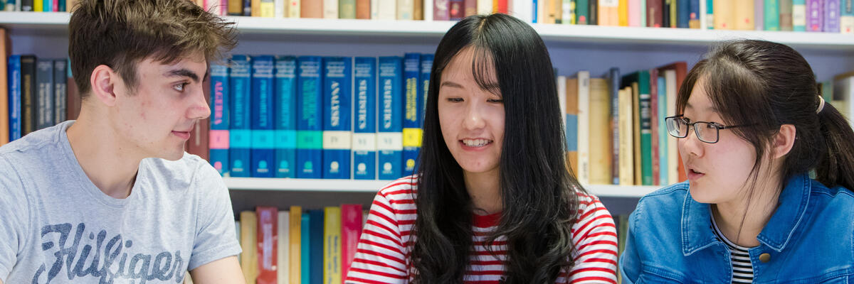 Students sat in the Maths section of the library