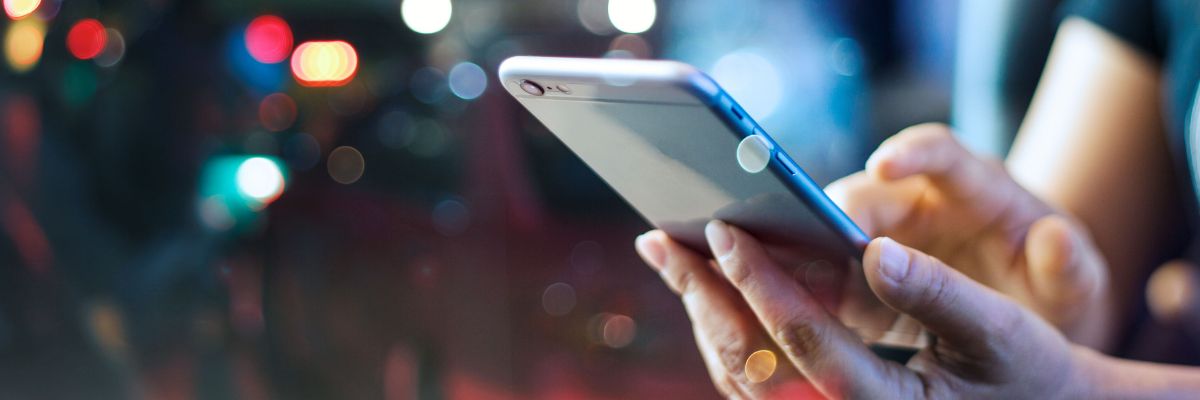 A person using a mobile phone