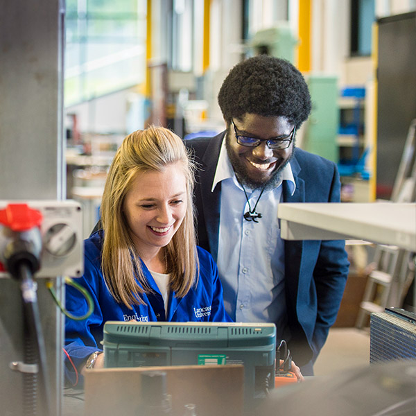 Two people work on the Engineering Department shop floor