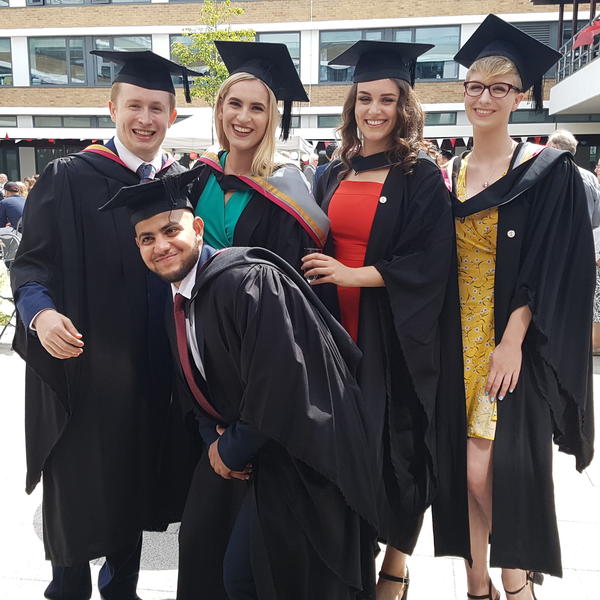 5 students celebrate their graduation