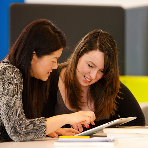 Two female students studying at a desk