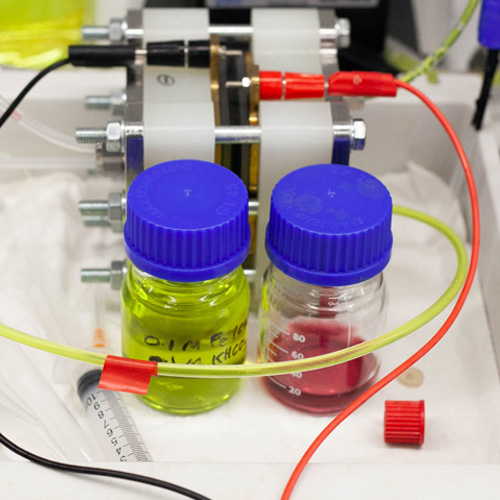 Two vials with electrodes attached