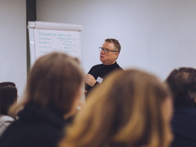 Support event with present talking to a crowd.