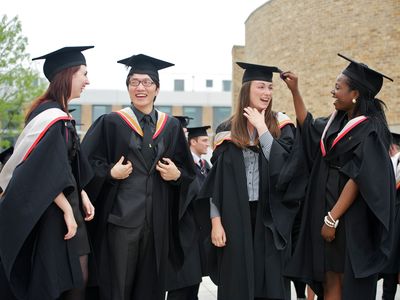 Four students at graduation