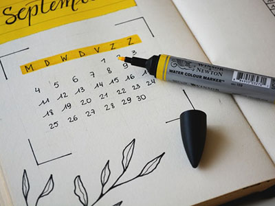 A monthly calendar in a bullet journal.