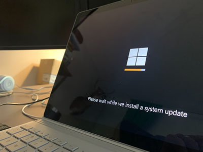 A laptop getting a Windows update.