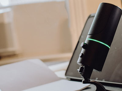 A microphone and a notebook.