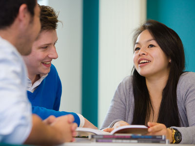 A meeting between three people.
