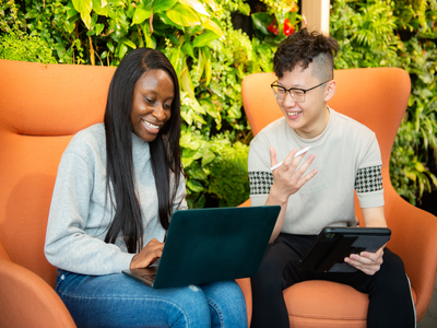 two students talking to each other