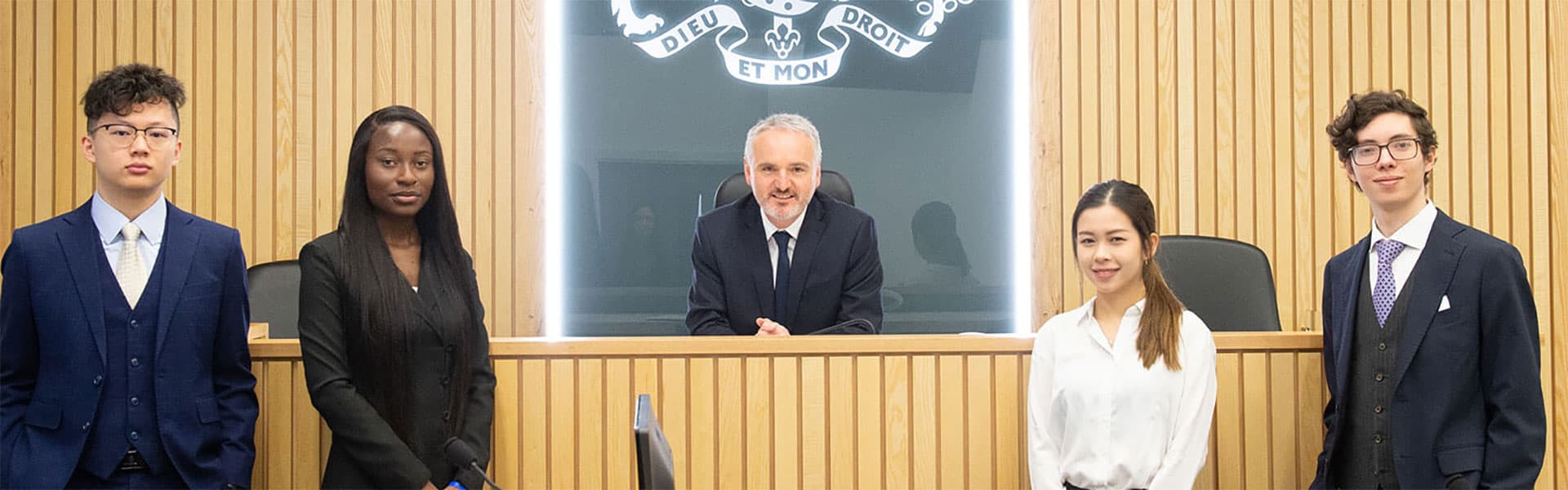 Students and a lecturer at the School of Law's courtroom