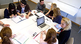 Staff sitting in a meeting